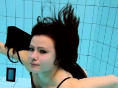 Kristy in a see through dress underwater