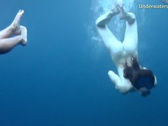 Hot erotica in the sea with 3 girls