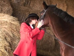 Classy mama playing with herself in a barn