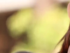 Solo video of masturbating girl in high socks outdoors