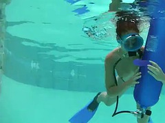 Hungarian beauty fucks a dildo underwater