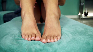 Milan Cheek being flexible and showing her feet off