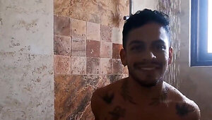 Tattooed Latino with a nice torso relaxing in the pool