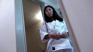 Yuki Shinoda is giving a blowjob in the bathroom to a man