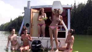 Girls in sexy bikinis fool around and get ready to get off