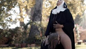 Lesbian nuns get freaky with each other outdoors