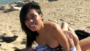 Charming chick is bouncing on his dick in an outdoor vid