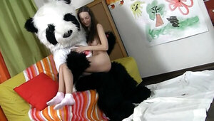 Petite amateur girl having sex with a horny panda