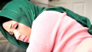 Goldie Rush wears a hijab and serves Quinton James