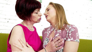 Young girl licks hairy muff of red-haired mature lady