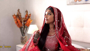 Tattooed Indian bride is reading to please her man