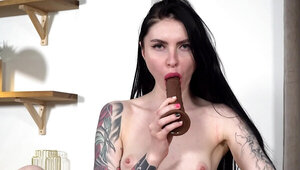 Inked girl Baby Chocolate masturbates in this solo video