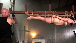 Bald master roughly penetrates attractive and tied up MILF