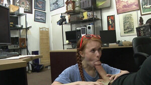 Ginger slut fucked on the desk and soaked in sperm