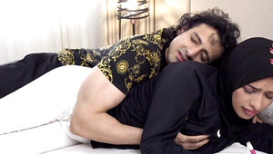 Hot Muslim woman wearing a hijab fucked by an Indian