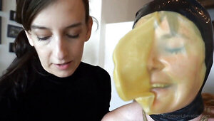 Chubby submissive woman lets the domina do everything