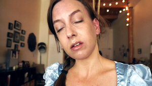 Solo masturbation scene showing a choking solo slut