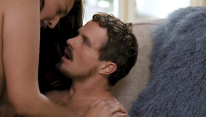 Brunette babe and her lover are having wild sex on the couch