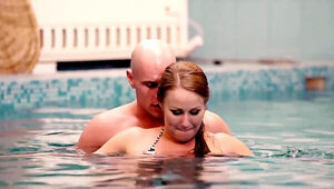 Teen swims in a pool and meets the bald guy to make it