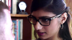 Nerdy girl Mia Khalifa seduces her classmate and rides his cock