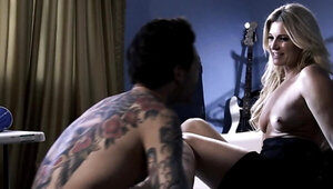 Tattooed rock musician and older woman devote time to foreplay