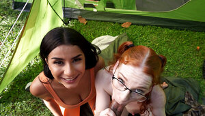 Redhead and brunette are having dick sucking competition