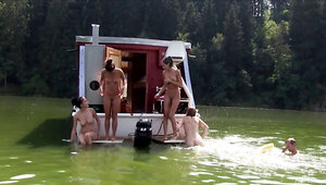 In a boat where they are having a wild summer adventure