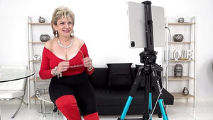 Sweet and horny grandma learns how to be a webcam model