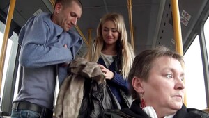 A blonde is getting fucked hard in the bus while people are looking