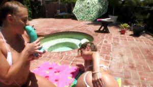 Sheena Shaw and Gia Derza playignwith big sex toys outdoors