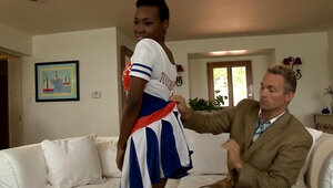 A black babe with short hair is getting her tight ass slapped