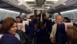 Pilot and a couple of sexy flight attendants fuck on the plane