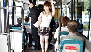 Lucky stranger gets a handjob from Japanese girl in the bus