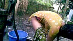 Bangla desi shameless village cousin-Nupur bathing outdoor