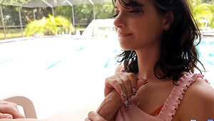 Adorable brunete with a pretty face takes care of a boner