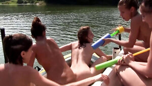 In a boat where they are having a wild summer adventure