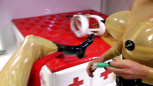 Gimp with a mask is bound and tortured by a dominant lady