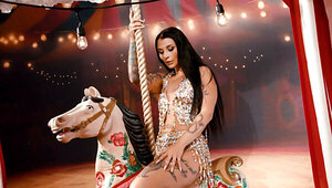 Hot brunette masturbates in one of the carnival tent