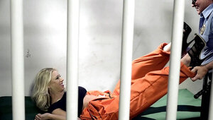 Severe prison guard has fun with an insidious blonde