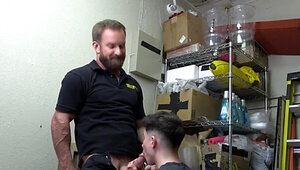Muscular security guard accuses the lad of shoplifting