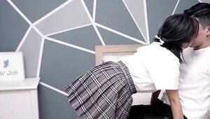 Asian girl blows her man and lits her skirt up to ride him