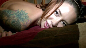 Inked MILF riding a big black cock in homemade video