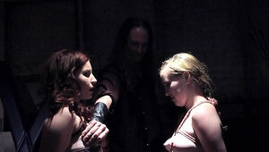 Two slavegirls are bound and dominated in this BDSM show