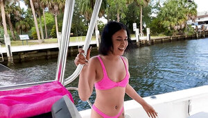Exotic chick teases friend in various ways during boat trip