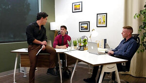 Tattooed lad is having a threesome in the office space