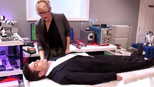 Kinky blonde is playing with her handsome sex android