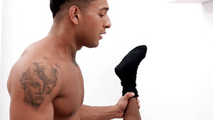 Latino hunk and a tall black fellow riding and sucking