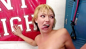 A shy little blonde with short hair is fucking in the locker room