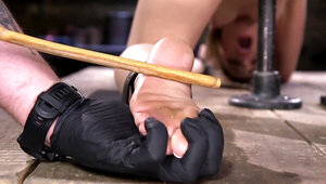 Bound slave girl gets tormented by her dungeon master