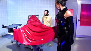 Fetish scene with lots of latex and some intense fisting